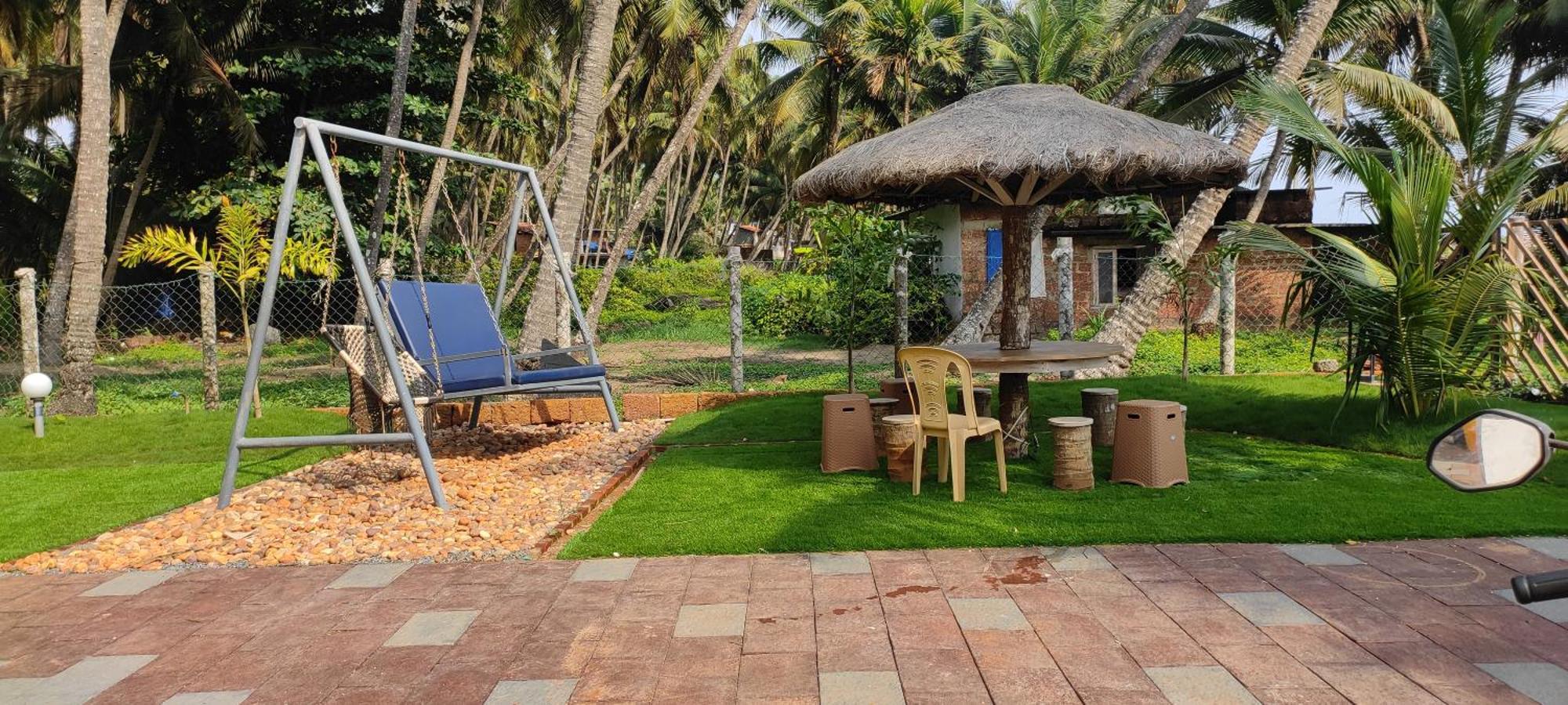 Corniche Beach Resort Mulappilangād Pokoj fotografie